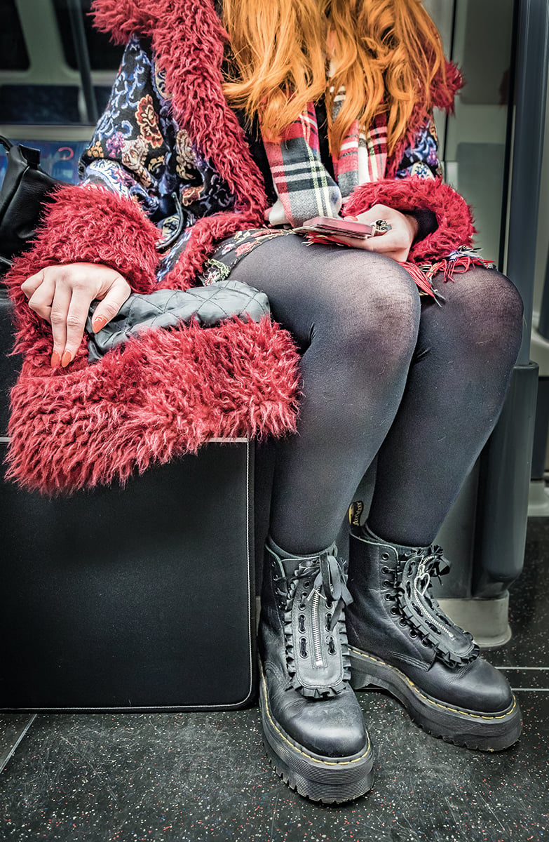 Grey Jubilee line, Westminster, tube stop, UNDERGROUND PORTRAITS, in blue, white and red font, Wolfgang Strassl in grey font below