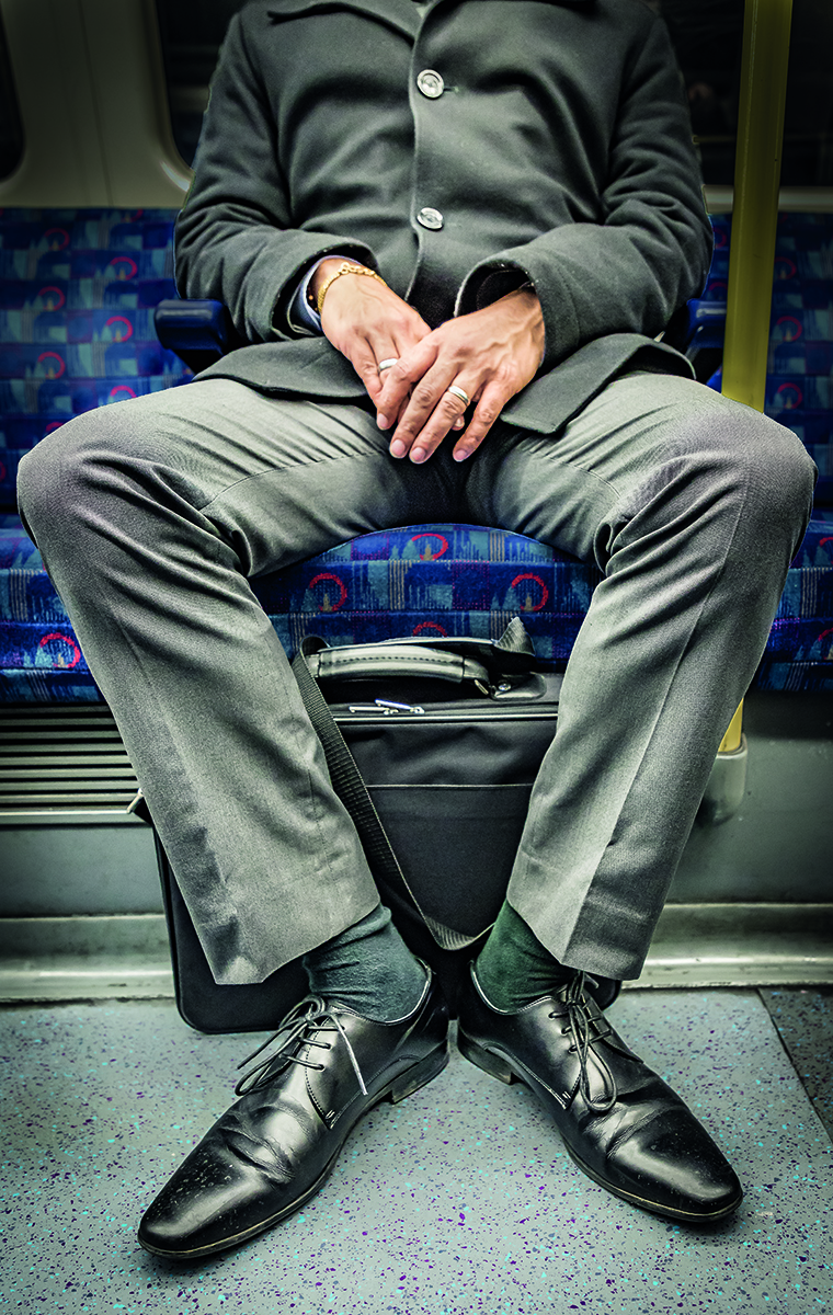 Grey Jubilee line, Westminster, tube stop, UNDERGROUND PORTRAITS, in blue, white and red font, Wolfgang Strassl in grey font below