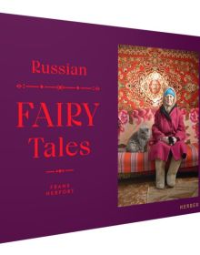 Book cover of Frank Herfort: Russian Fairytales; with a figure sitting on a sofa with a grey cat. Published by Kerber.