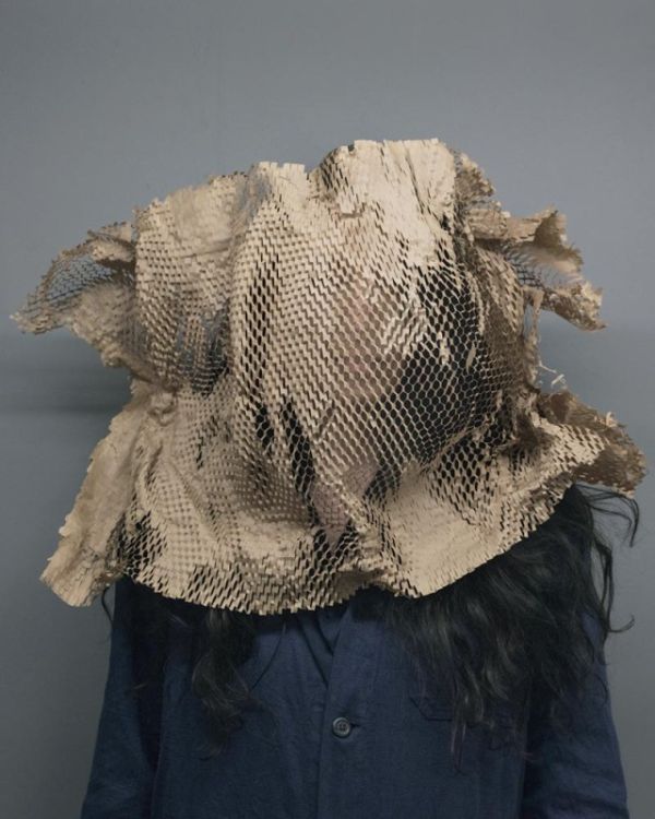 Book cover of Jackie Nickerson: Field Test; with pink bag over a figure's head. Published by Kerber.