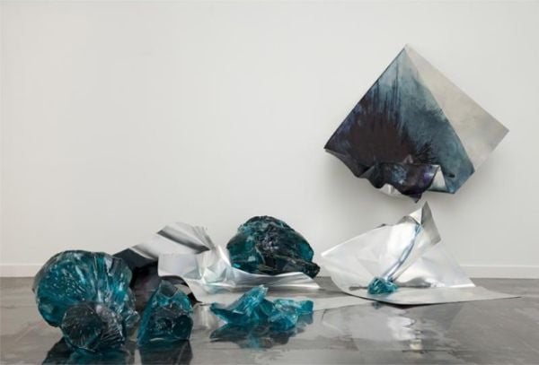 Off white cover with colourful sections of gold, green and pink with drips of dark blue paint and Myriam Holme 2010 – 2020 in small black font below