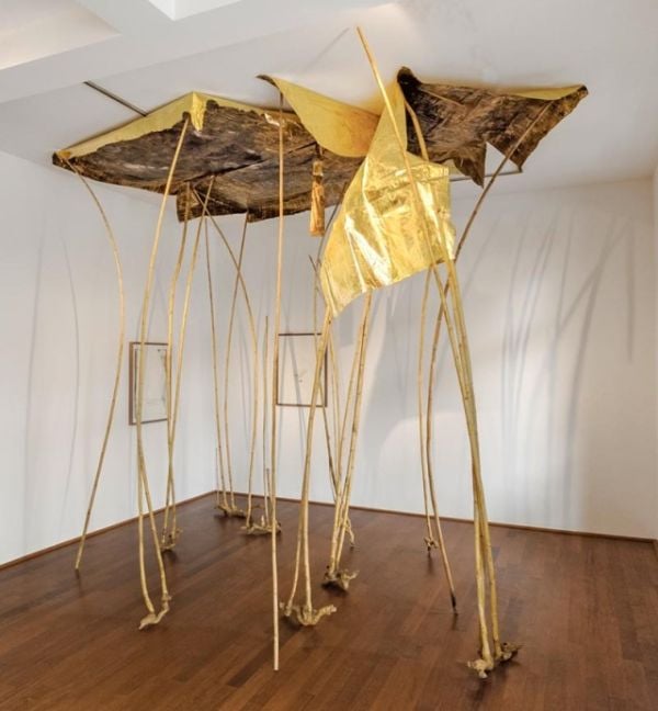 Off white cover with colourful sections of gold, green and pink with drips of dark blue paint and Myriam Holme 2010 – 2020 in small black font below