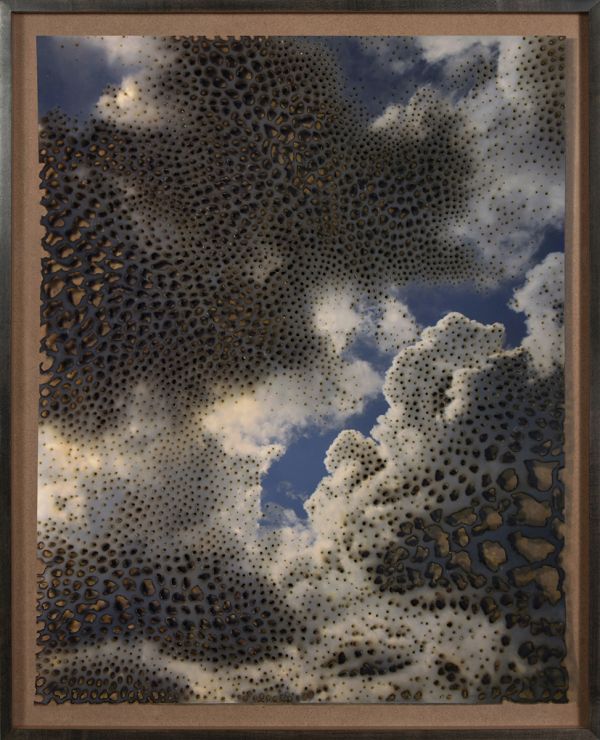 Book cover of Miguel Rothschild: Premonition, with a blue sky white clouds. Published by Kerber.