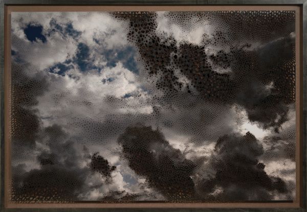 Book cover of Miguel Rothschild: Premonition, with a blue sky white clouds. Published by Kerber.