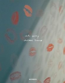 Book cover of Mika Sperling: Mother Tongue, with a wall covered with pale pink lipstick kiss marks. Published by Kerber.