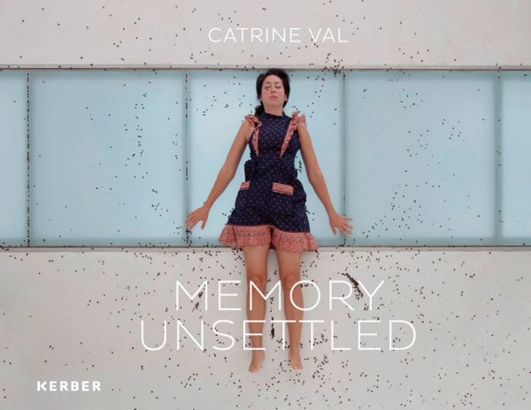 Book cover of Catrine Val: Memory Unsettled, featuring a female laying on beige stone and glass floor, surrounded by black specs. Published by Kerber.