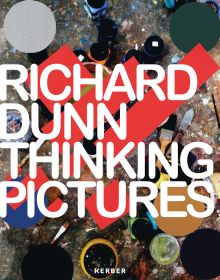 Aerial view of painted art boards on paint splattered floor, on cover of 'Richard Dunn, Thinking Pictures', by Kerber.