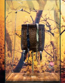 Book cover of Maximilian Prüfer, Sparrow War, with a person walking away from camera through blossom trees. Published by Kerber.