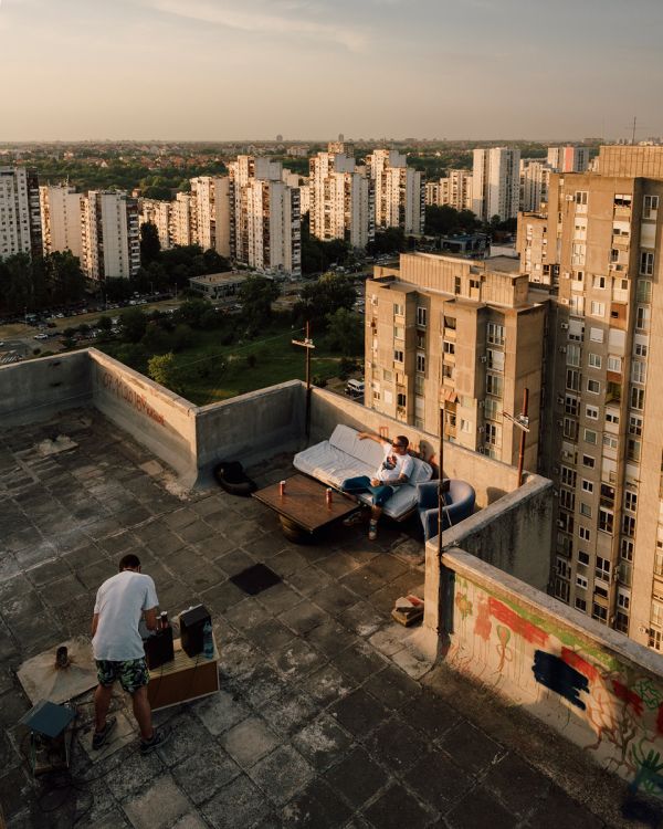 Tower block with red filter, on cover of 'Marius Svaleng Andresen, Life in the New', by Kerber.