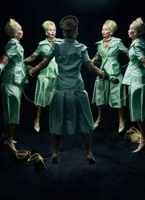 Landscape book cover of René Riis, Conversation with My Other Me, with mirrors creating five images of the same man with large grey beard, wearing a red and white checked jacket, sitting at table. Published by Kerber.