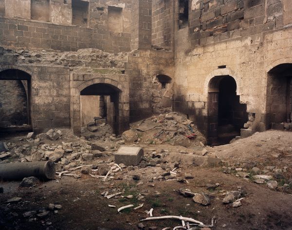 Stone structures in the dusty Dara Ancient City in Mardin, Turkey, Mesopotamia Anatolia, on cover of 'Andréas Lang, Broken Memories', by Kerber.