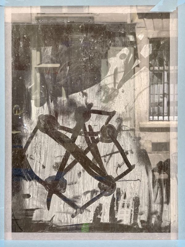 Blue book cover of Frizzi Krella, Paris - 9 Rue de l’Université', featuring a building with windows overlaid with black abstract star shape. Published by Kerber.