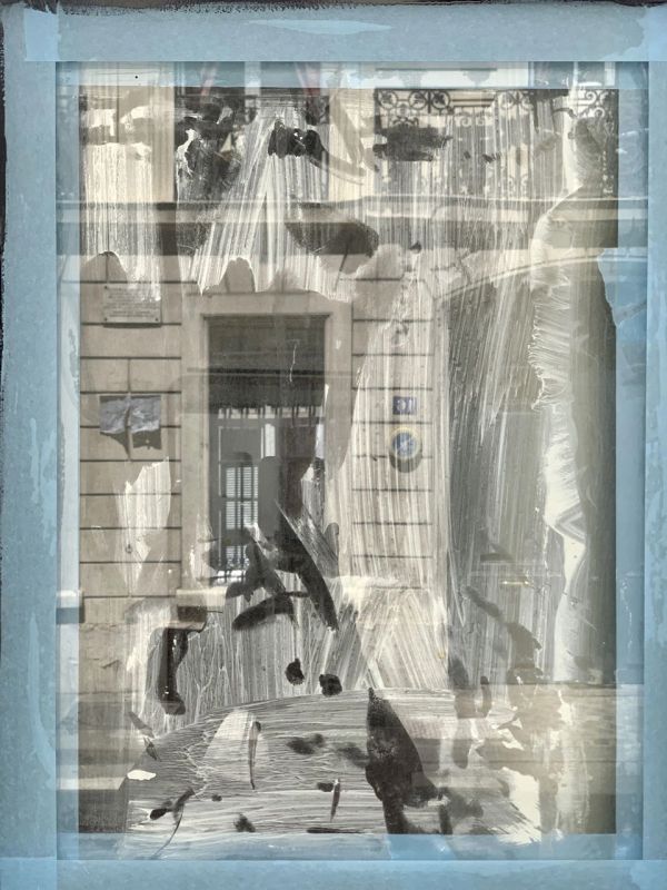 Blue book cover of Frizzi Krella, Paris - 9 Rue de l’Université', featuring a building with windows overlaid with black abstract star shape. Published by Kerber.