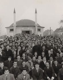 Book cover of Moin und Salam: Muslim Life in Germany, with an orange train and mosque behind. Published by Kerber.