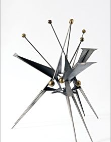 Book cover of Hans Uhlmann, with a black, metal sculpture. Published by Kerber.