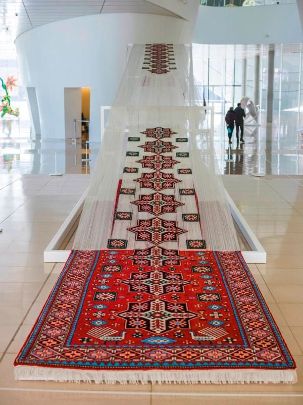 Book cover of Faig Ahmed; featuring a surrealist weaving. Published by Kerber.