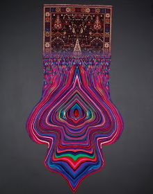 Book cover of Faig Ahmed, with a large, red textile rug suspended on white exhibition wall, with the black bottom half in shape of spilt liquid. Published by Kerber.