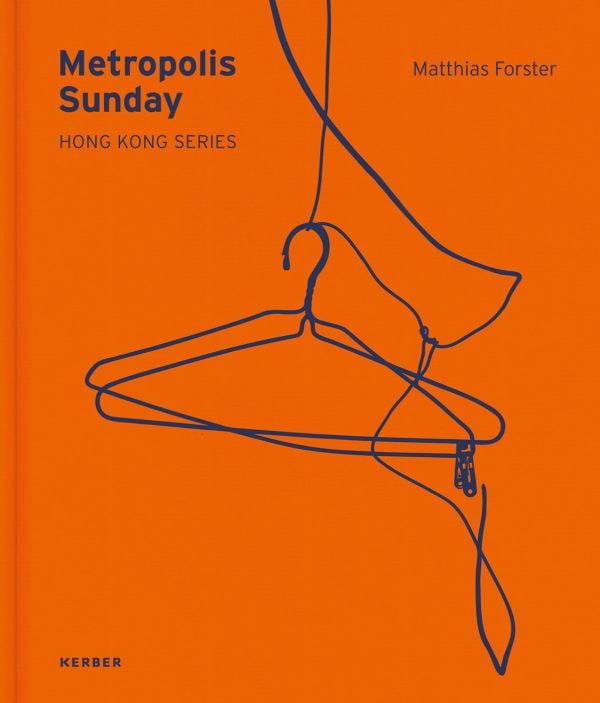 Book cover of Metropolis Sunday: Matthias Forster: Hong Kong Series, with two wire coat hangers. Published by Kerber.