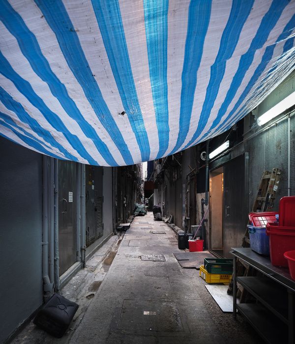 Book cover of Metropolis Sunday: Matthias Forster: Hong Kong Series, with two wire coat hangers. Published by Kerber.