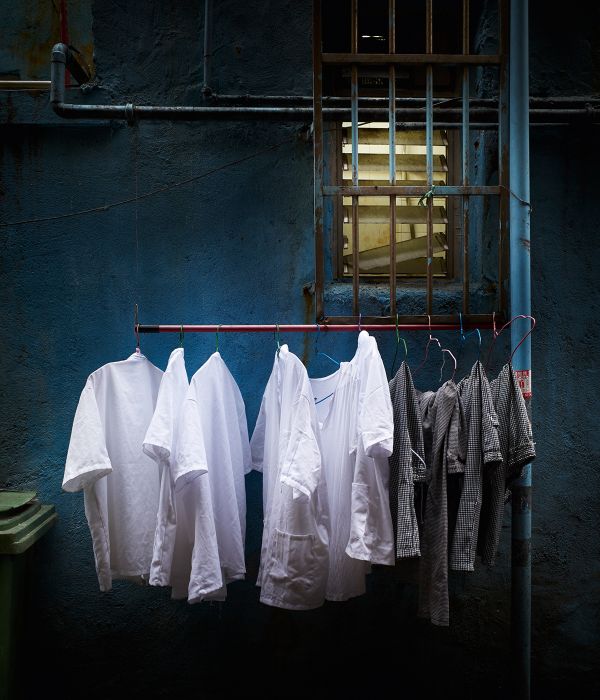 Book cover of Metropolis Sunday: Matthias Forster: Hong Kong Series, with two wire coat hangers. Published by Kerber.