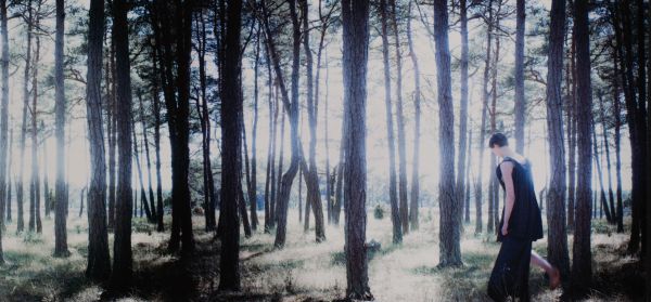 Book cover of Scenes from an Island: Florence Montmare, with two figures standing near a rocky coastline looking out to sea. Published by Kerber.