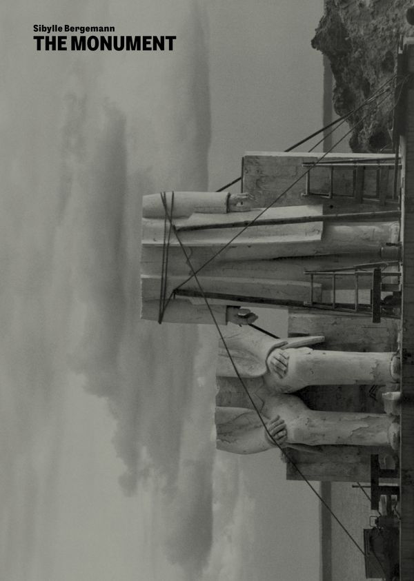 Book cover of The Monument: Sibylle Bergemann; featuring two large stone figures with their head and shoulders missing. Published by Kerber.