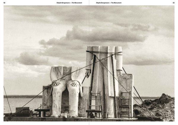 Book cover of The Monument: Sibylle Bergemann; featuring two large stone figures with their head and shoulders missing. Published by Kerber.