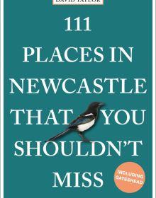 Magpie near center of green cover of '111 Places in Newcastle That You Shouldn't Miss', by Emons Verlag.
