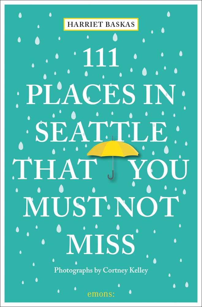 111 PLACES IN SEATTLE THAT YOU MUST NOT MISS in white font on green cover with white raindrops, yellow umbrella near centre.