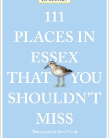 Sandpiper bird near centre of pale blue cover of '111 Places in Essex That You Shouldn't Miss', by Emons Verlag.