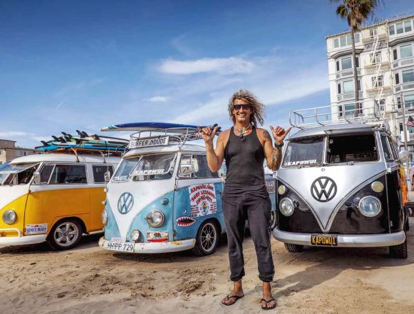 Book cover of 111 VW Bus Stories That You Should Know, with a yellow VW campervan with split-screen. Published by Emons Verlag.