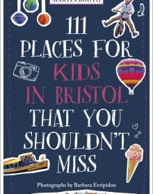 Book cover of 111 Places for Kids in Bristol That You Shouldn't Miss, with a hot air balloon. Published by Emons Verlag.