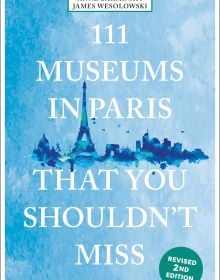 Book cover of 111 Museums in Paris That You Shouldn't Miss, with a watercolor of the Eifel Tower. Published by Emons Verlag.