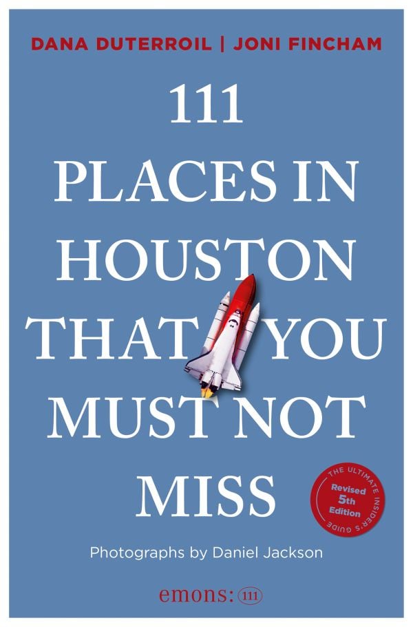 Book cover of 111 Places in Houston That You Must Not Miss; featuring a space rocket taking off. Published by Emons Verlag.