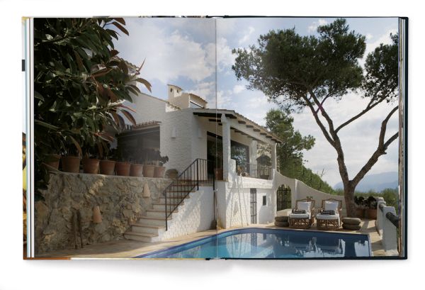 Dressing table with mirror, framed picture and carved sculpture, LIFE AND WORK, in white font above.