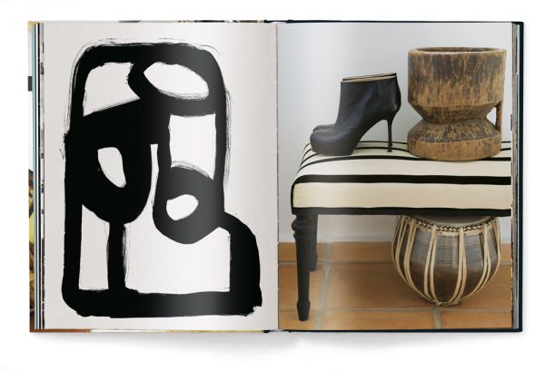 Dressing table with mirror, framed picture and carved sculpture, LIFE AND WORK, in white font above.