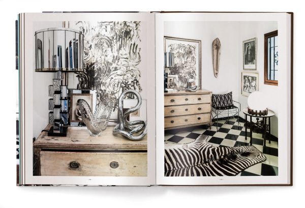 Interior space with wood dining table on rug, MOVE AND WORK, in white font above.