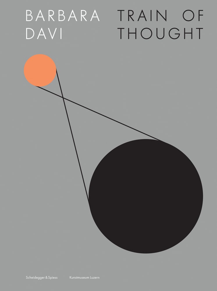 Black circle attached to smaller orange circle by fine thread on grey cover, Barbara Davi Train of Thought in white and black font above