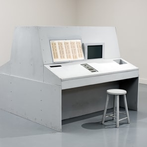 Collage page with high rise building, 2 portraits of male either side, yellow cover, anarchy sign to right corner, STEPHEN WILLATS in black font on white border.