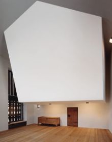 Book cover of Close-up - Ruch & Partner Architects 1994-2016, featuring a stone structure with mountainous landscape behind. Published by Scheidegger & Spiess.