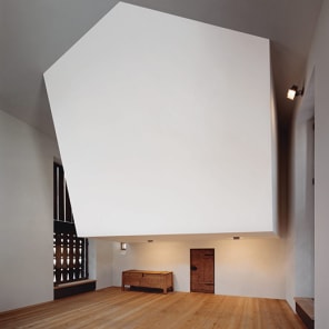 Book cover of Close-up - Ruch & Partner Architects 1994-2016, featuring a stone structure with mountainous landscape behind. Published by Scheidegger & Spiess.