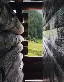 Book cover of Close-up - Ruch & Partner Architects 1994-2016, featuring a stone structure with mountainous landscape behind. Published by Scheidegger & Spiess.