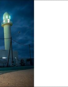 Book cover of Unresolved; with a camouflaged soldier leaning on building, with townspeople walk past brick building. Published by Scheidegger & Spiess.