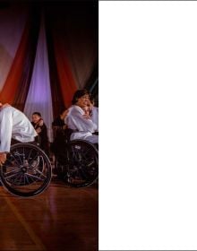 Book cover of Unresolved; with a camouflaged soldier leaning on building, with townspeople walk past brick building. Published by Scheidegger & Spiess.