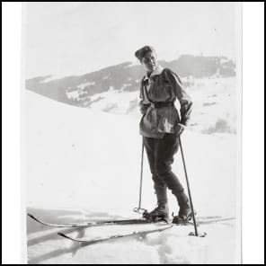 Bookshelf and table full of books and papers, The Giedion World Siegfried Giedion and Carola Giedion-Welcker in Dialogue in black font on bottom white banner