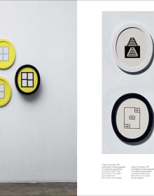 Geometric print of yellow flower shapes and blue lines joined to make squares, off white cover, HONG SEUNG-HYE ORGANIC GEOMETRY in blue font.