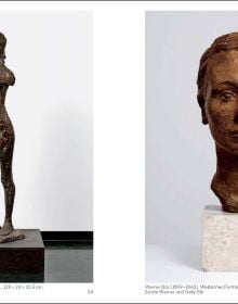 Framed image of Mickey Mouse leaning against white interior wall with mirror and chandelier above, The Julius Baer Art Collection in black font above.