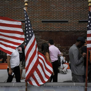 Newspaper front page with article headings, New Cut in black at top and American Readers at Home vertically on right in black font on white cover.