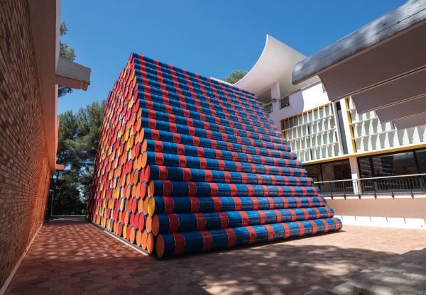 Book cover of Christo and Jeanne-Claude: Barrels, with the tops of a collection of metal oil drums. Published by Verlag Kettler.