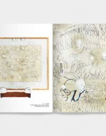 Book cover of Mary Bauermeister, Signs, Words, Universes, with convex glass with bubbles and notes in pen. Published by Verlag Kettler.